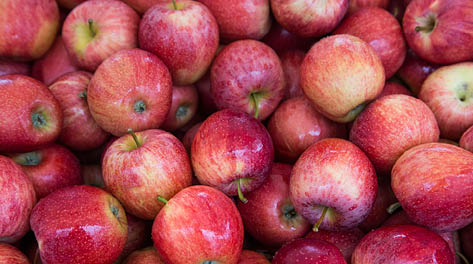 Red apples background at departmental store