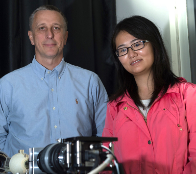 Researchers Tomasz Tkaczyk and Ye Wang, who earned her doctorate this year at Rice, led the development of a portable spectrometer able to capture far more data much quicker than other fiber-based systems. The TuLIPSS camera will be useful for quick analysis of environmental and biological data. Photo by Jeff Fitlow