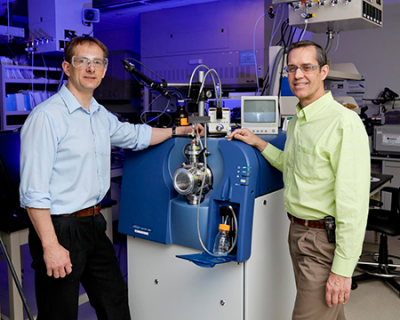 Photo of an open port sampling probe with its inventors, Vilmos Kertesz and Gary Van Berkel. Photo courtesy: ORNL