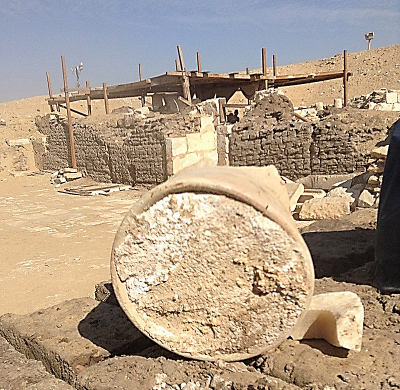 Photo of the old cheese in its container at the excavation site in Egypt.