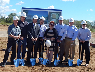 Photograph of Renishaw’s senior executive management team breaking ground on the new facility