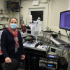 Photo of Kendra Furber with her FT-IR imaging instrumentation